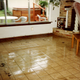 After the second, more minor flood of 1989—only a few inches in the house! Note the teak coffee table—hard, durable wood for floods.